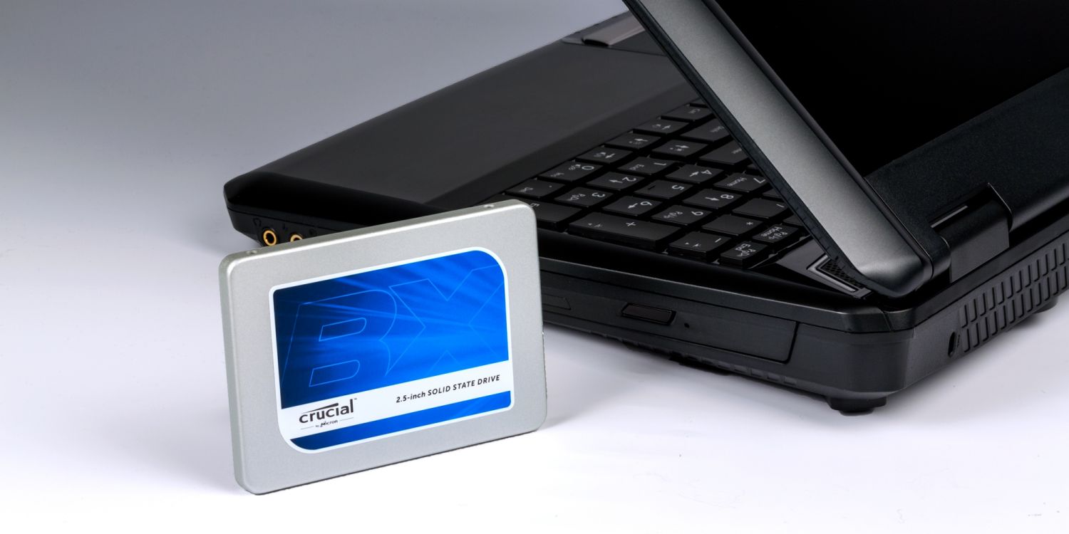 A Crucial SSD drive and a laptop.