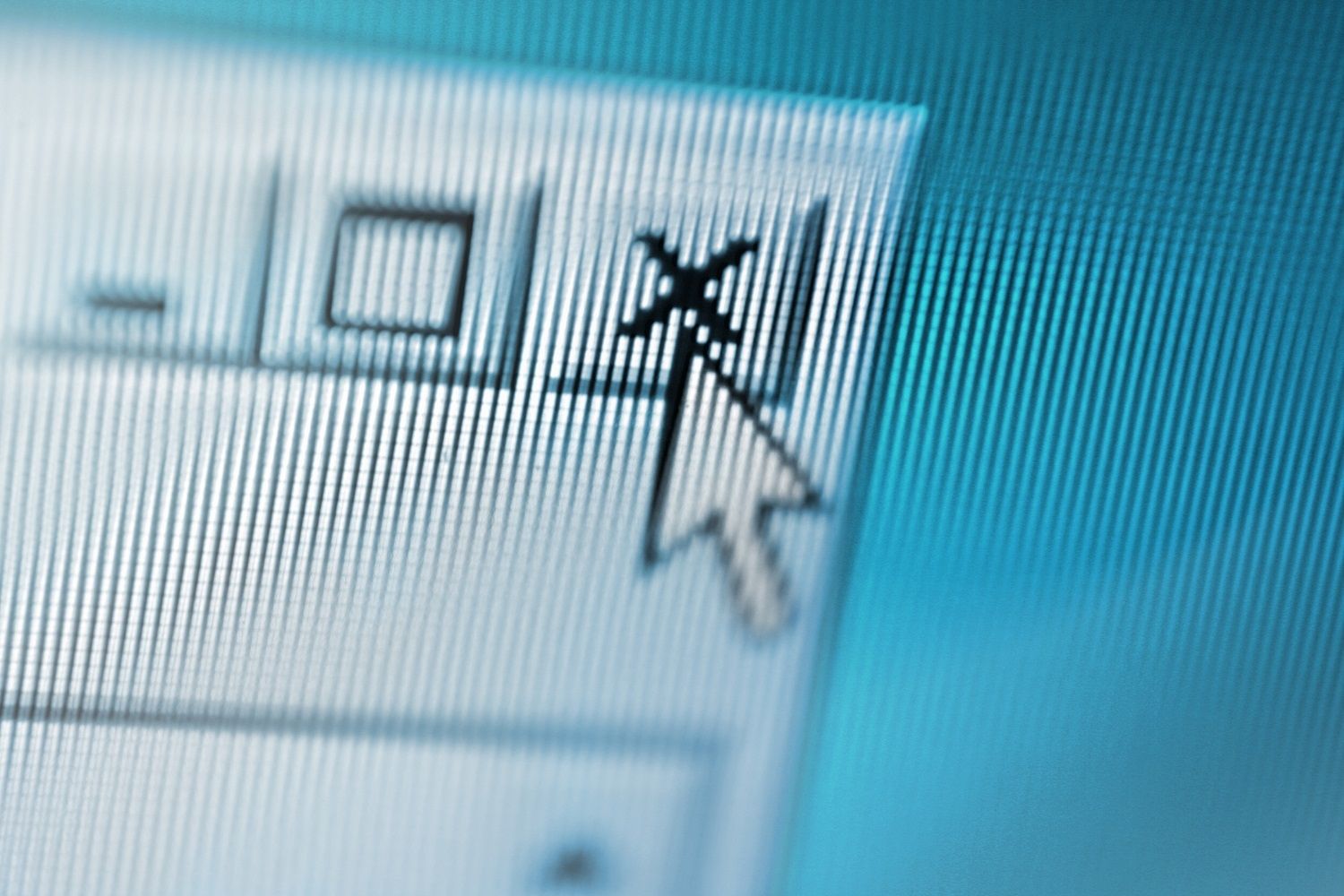 Close up of a computer screen whereby a mouse pointer is closing a suspicious pop-up window