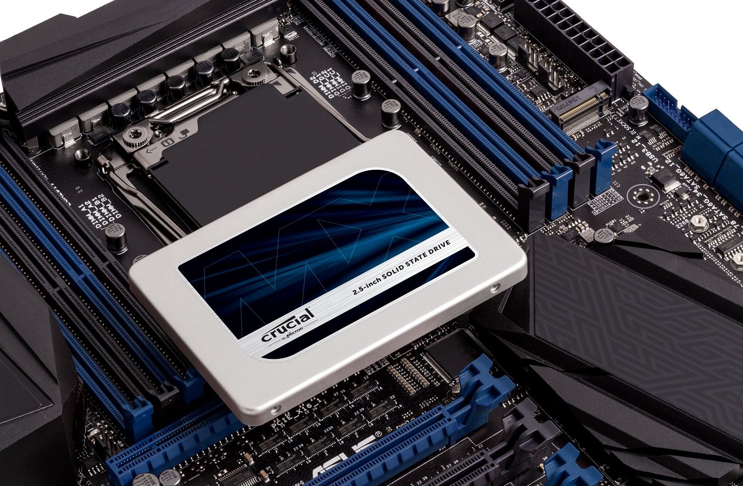 A Crucial SSD placed on top of a motherboard